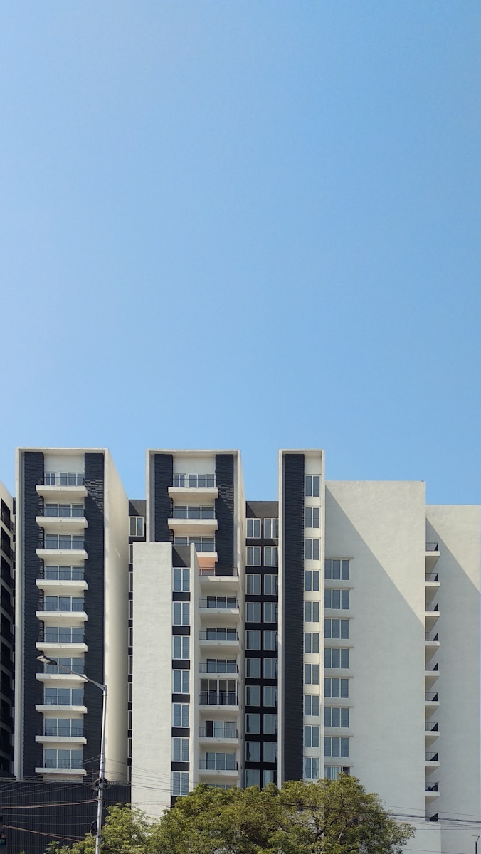 white concrete building under blue sky during daytime