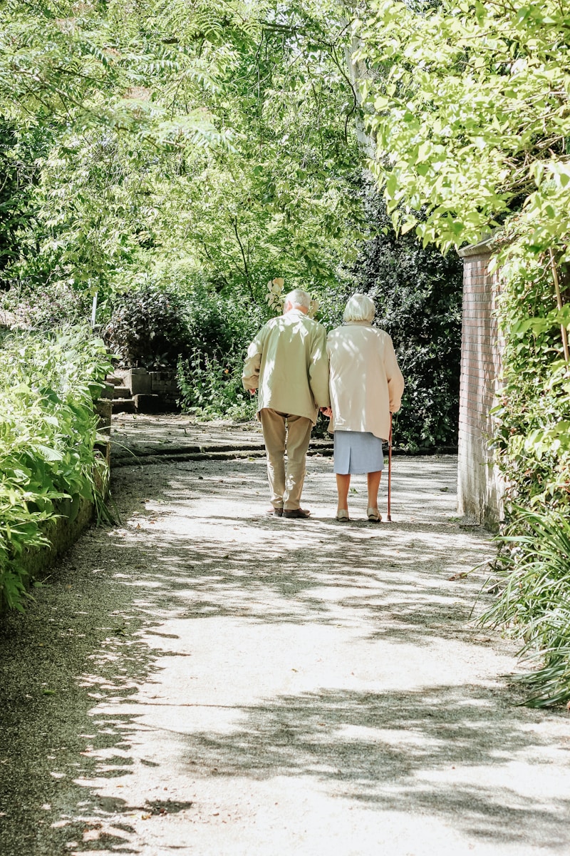 Photo by micheile henderson man and woman walking on road during daytime