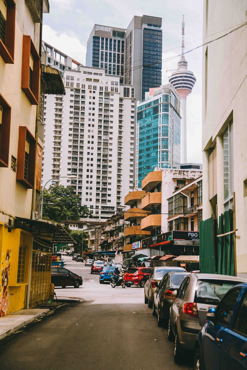 A city street filled with lots of tall buildings