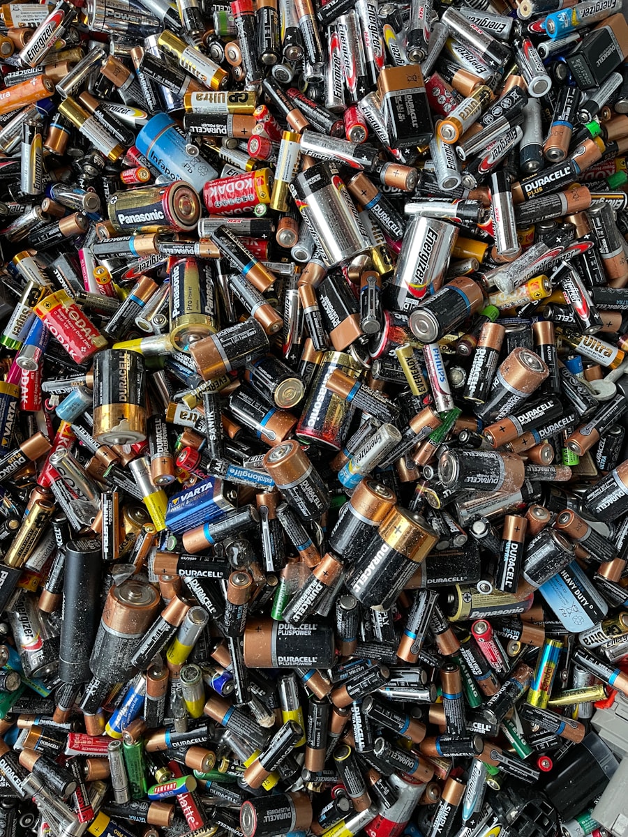 a pile of different types of batteries and batteries