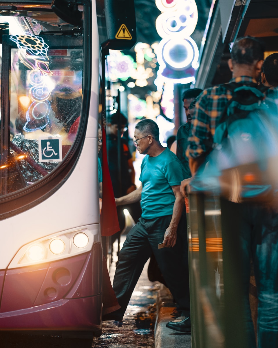 man going in bus