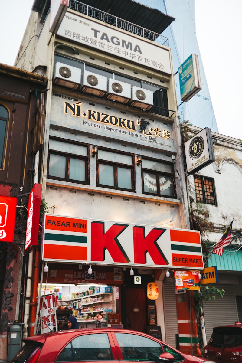 Building facade with large red kk sign