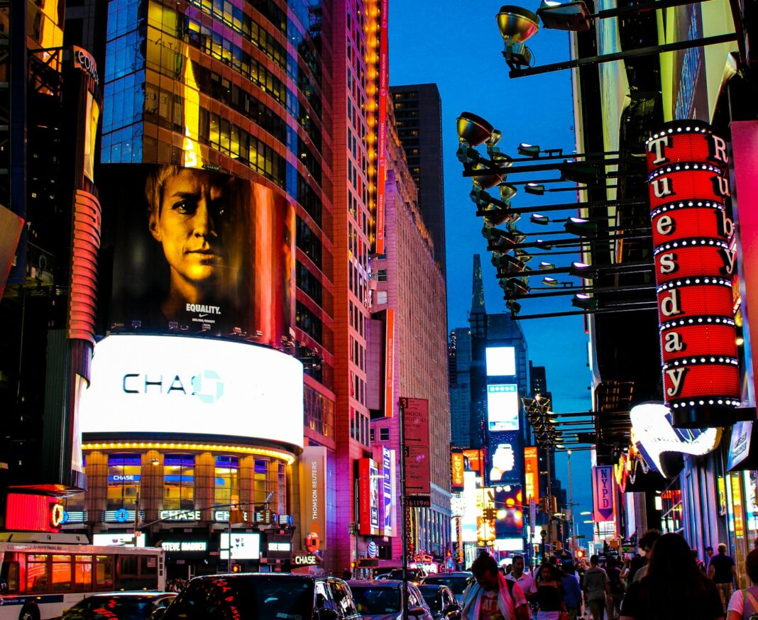 people walking on street during night time