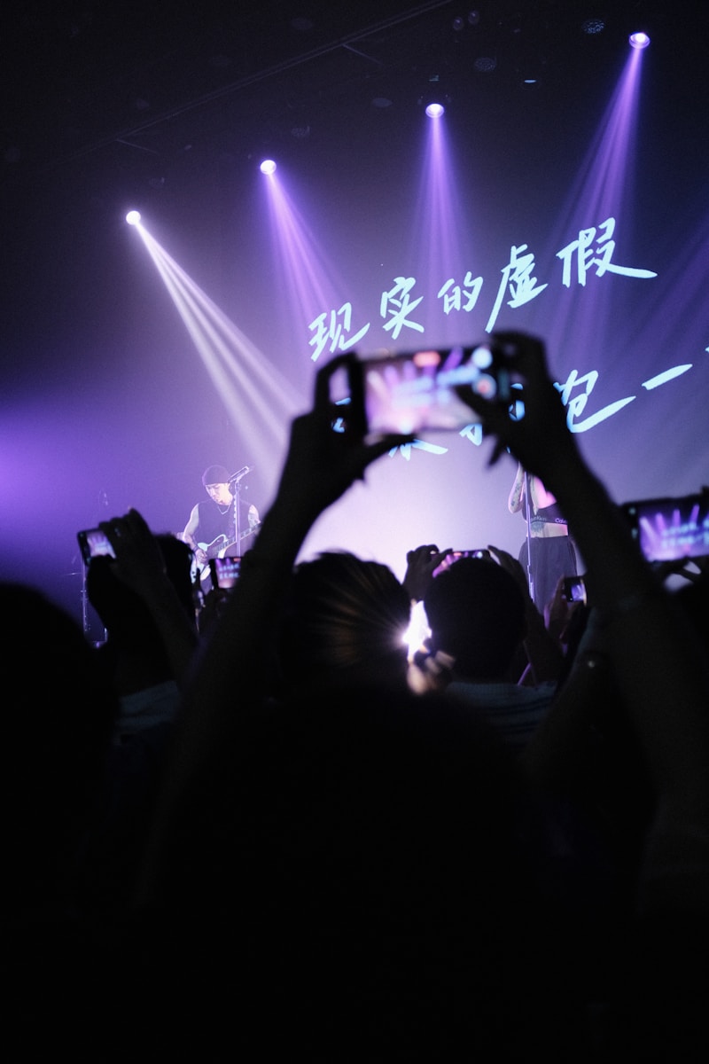 a person sitting on a stage