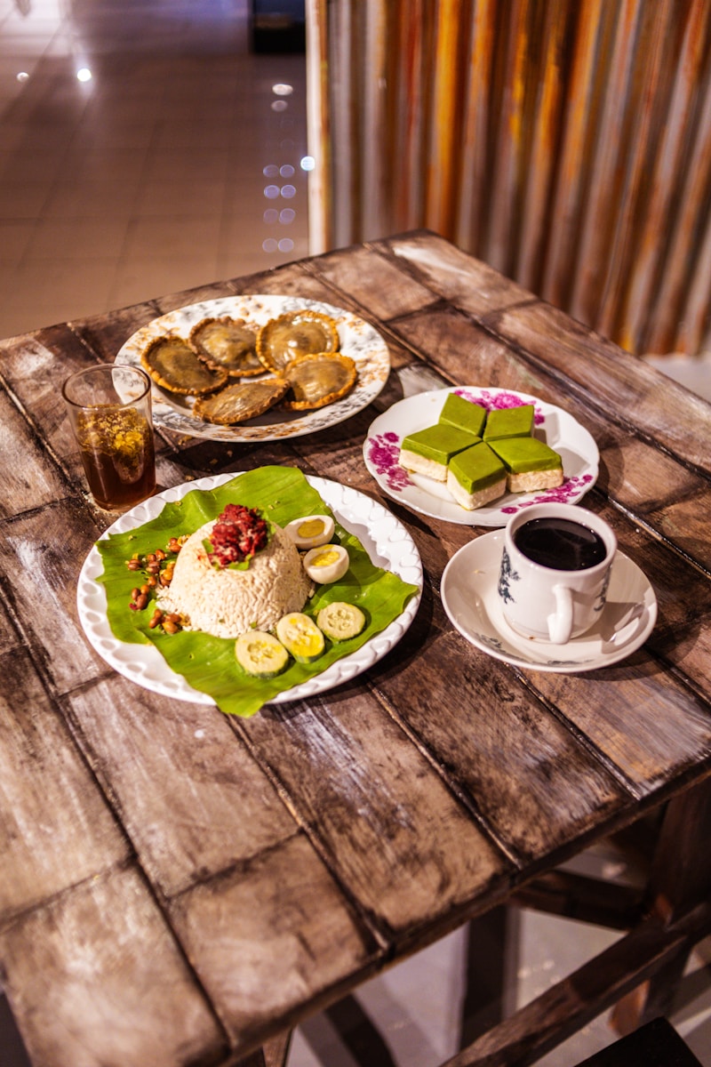 Traditional indonesian food and coffee are displayed.