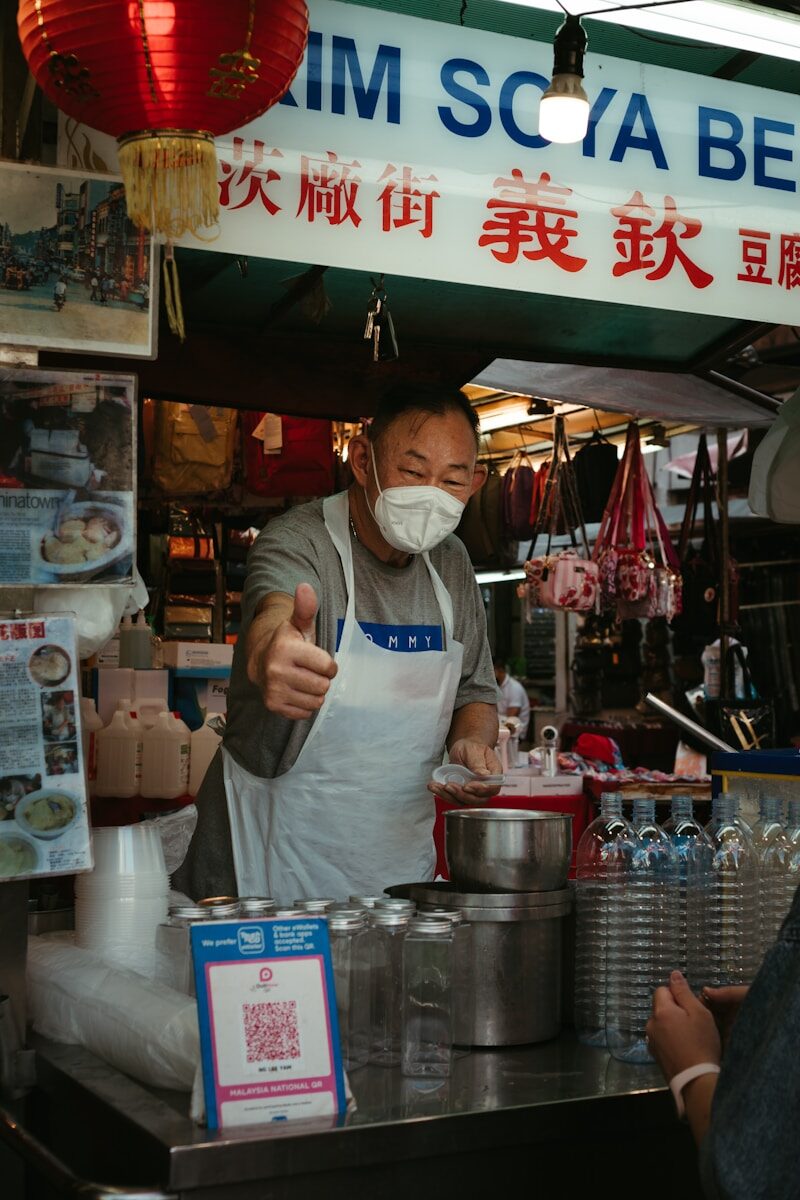 a person wearing a white face mask