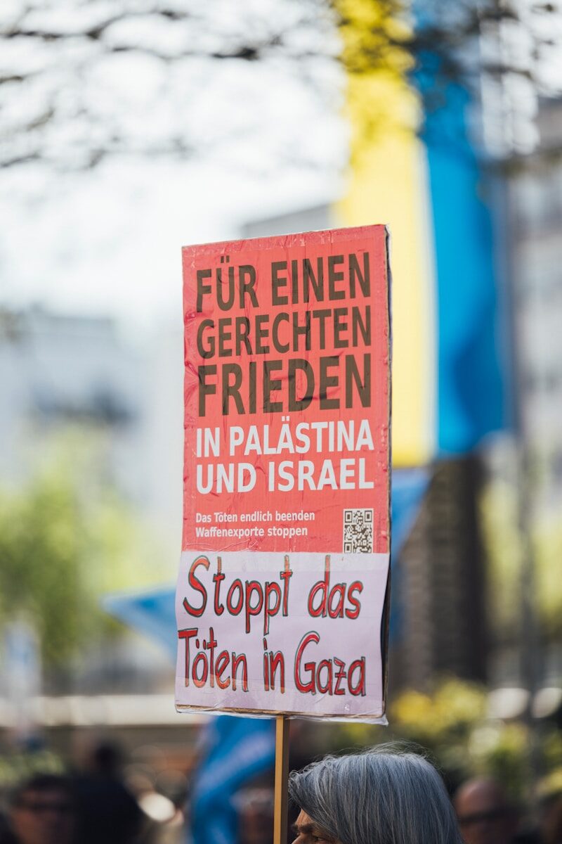 Sign calls for just peace in palestine, israel, and gaza.