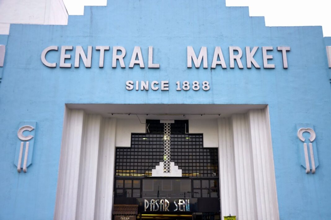 Iconic blue art deco facade of Central Market, a heritage landmark in Kuala Lumpur.