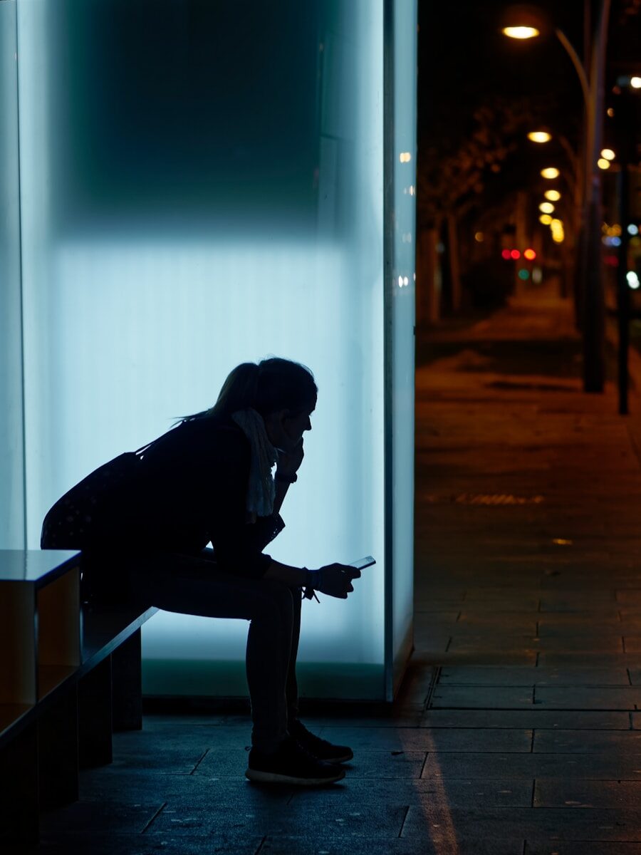 woman sitting on bench